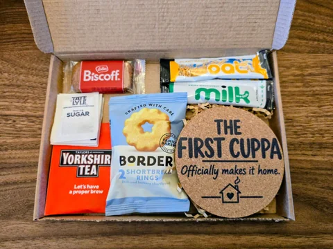 First Cuppa tea housewarming gift with a coaster, tea and biscuit treats