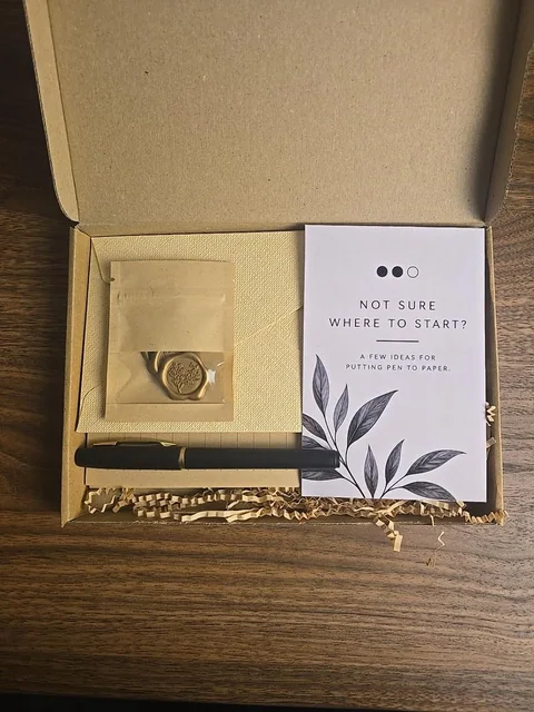 Gold-coloured Write Back stationery in the gift box