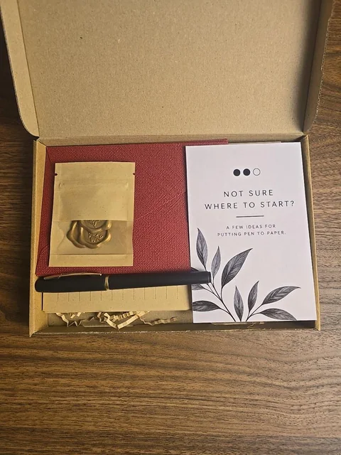 Wine-red Write Back stationery packed in its gift box